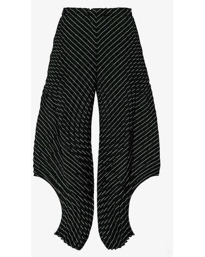 Issey Miyake Curved Pleated Tapered-leg Wool-blend Trousers - Black