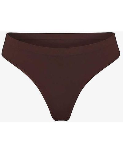 Skims Smoothing Mid-rise Stretch-woven Thong X - Purple