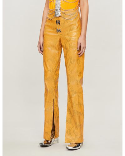 Leo Gaia Relaxed-fit Faux-snakeskin Trousers - Orange