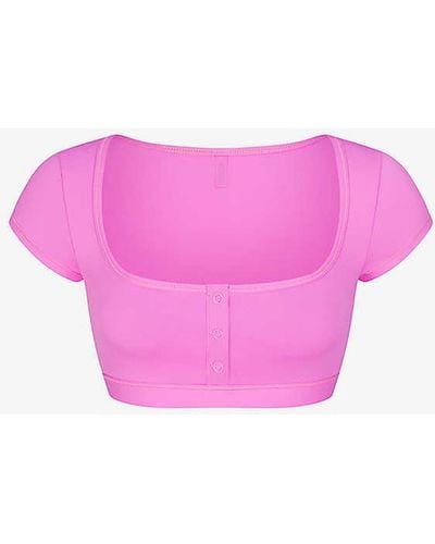 Skims Signature Swim Round-neck Cropped Stretch Recycled-nylon Bikini Top - Pink