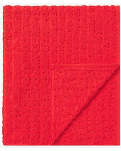 Skims Brand-embossed Stretch-recycled Nylon Towel - Red