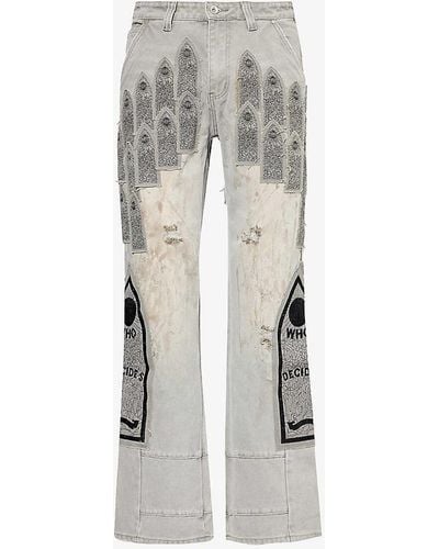 Who Decides War Distressed Branded-patch Denim Trousers - Grey