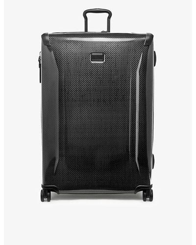 Tumi Extended Trip Expandable Four-wheel Shell Packing Suitcase - Black