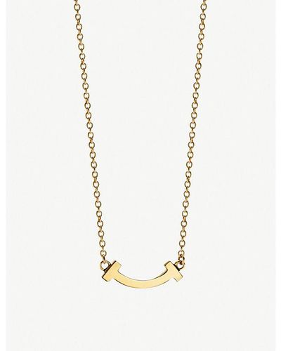 Tiffany T Smile Pendant in White Gold, Small | Tiffany & Co.