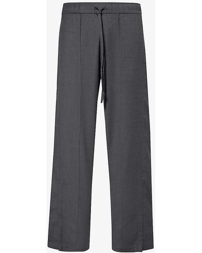 NAHMIAS Brand-patch Drawstring-waistband Relaxed-fit Wide-leg Wool Trousers - Grey