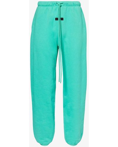 Fear Of God Essentials Brand-print Relaxed-fit Cotton-blend jogging Bottoms X - Green