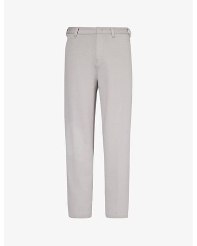 Emporio Armani Logo-plaque Tapered-leg Cotton-blend Pique Pants - Grey