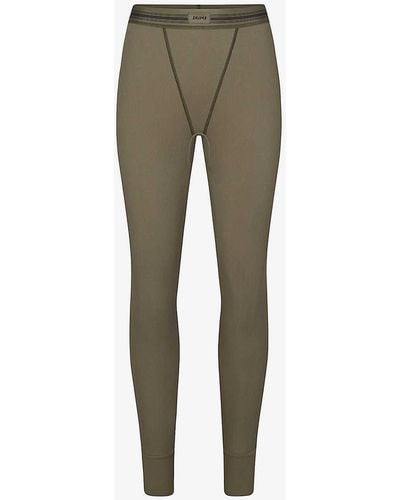 Skims Logo-patch Ribbed Stretch-cotton leggings - Green