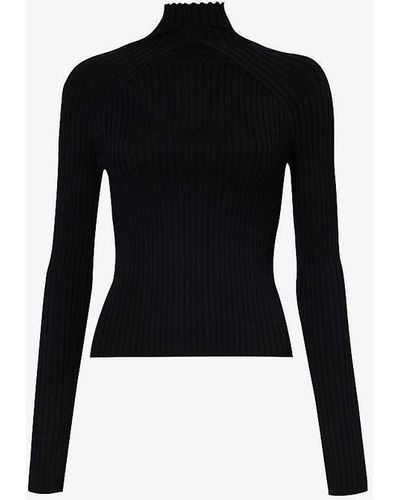 Alaïa Ribbed Turtleneck Wool-blend Top - Black