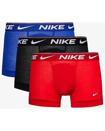 Nike Log-waistband Pack Of Three Stretch-recycled Polyester Trunks - Red
