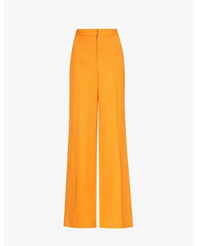 Stella McCartney Structured-waistband Flared-leg High-rise Woven Trousers - Orange
