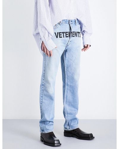 Vetements Logo-print Regular-fit Straight Jeans - Blue
