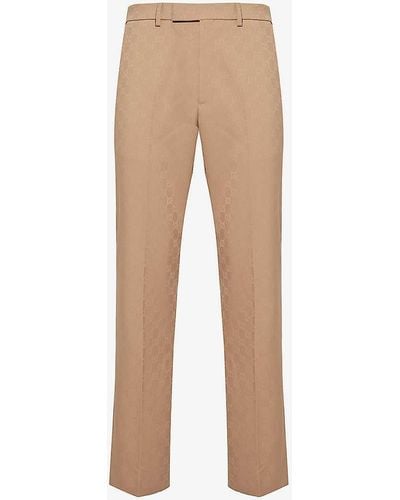 Gucci Monogram-embellished Tapered-leg Woven Trousers - Natural
