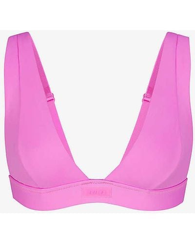 Skims Signature Swim Plunge Stretch Recycled-nylon Bikini Top - Pink