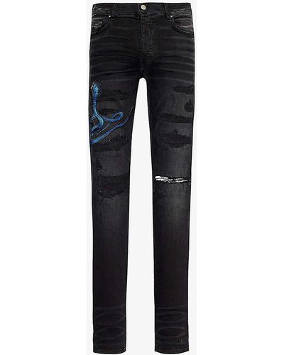 Amiri Snake-patch Slim-fit Tapered Stretch-denim Jeans - Black