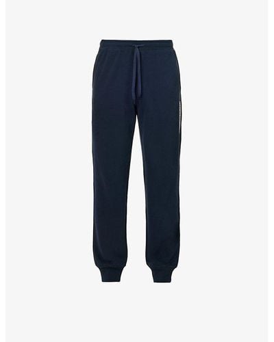 Emporio Armani Brand-print Tapered-leg Cotton-jersey jogging Bottoms - Blue