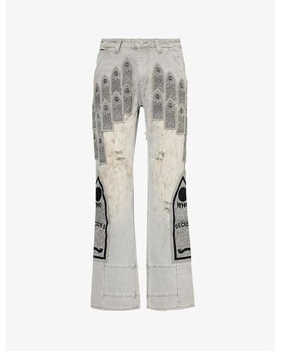 Who Decides War Distressed Branded-patch Denim Pants - Gray