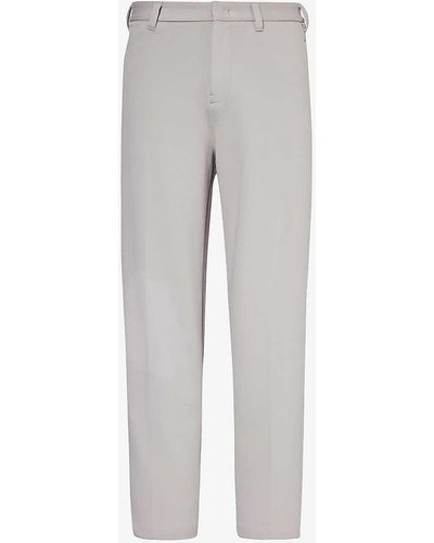 Emporio Armani Logo-plaque Tapered-leg Cotton-blend Pique Trousers - Grey