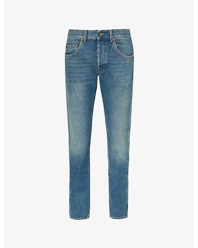 Gucci Brand-patch Faded-wash Mid-rise Tapered-leg Jeans - Blue