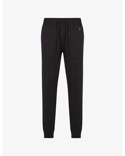 AllSaints Raven Logo-embroidered Cuffed Cotton-jersey jogging Bottoms - Black