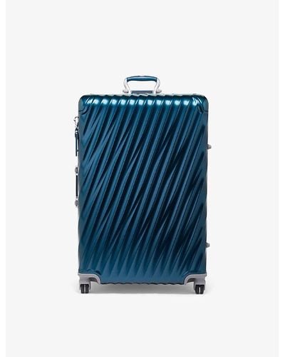Tumi Extended Trip Expandable Four-wheeled Aluminium Suitcase - Blue
