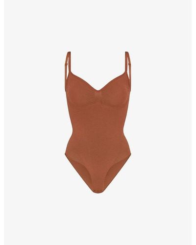 SKIMS Sculpting Bodysuit with Snaps in Black - $63 - From Audree