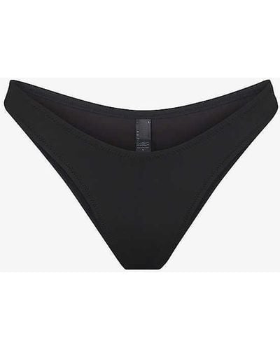 Skims Tanga Mid-rise Recycled Stretch-nylon Bikini Bottom - Black
