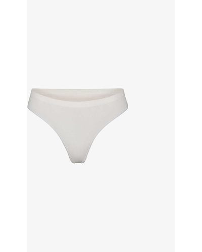 Skims Smoothing Mid-rise Stretch-woven Thong - White