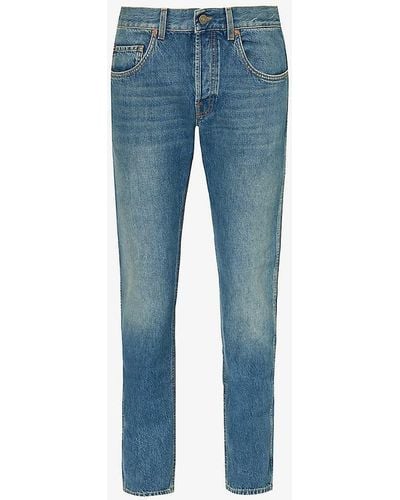 Gucci Brand-patch Faded-wash Mid-rise Tapered-leg Jeans - Blue