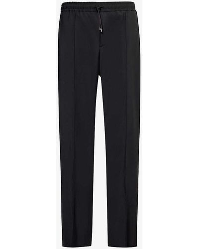 Valentino Brand-appliqué Tapered-leg Wool-blend Trousers - Blue