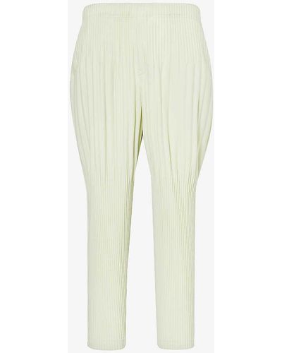 Homme Plissé Issey Miyake Pleated Tapered-leg Relaxed-fit Knitted Trousers - Natural