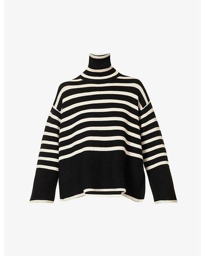 Totême Striped Turtleneck Wool-blend Knitted Sweater - Black