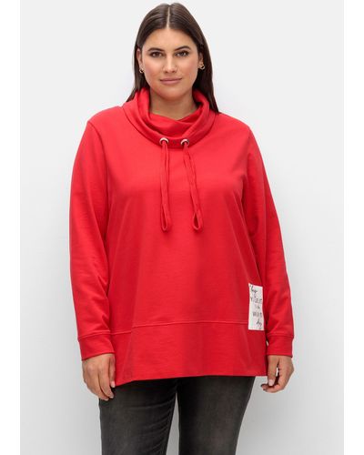Sheego Sweatshirt mit Stehkragen und Applikation seitlich - Rot