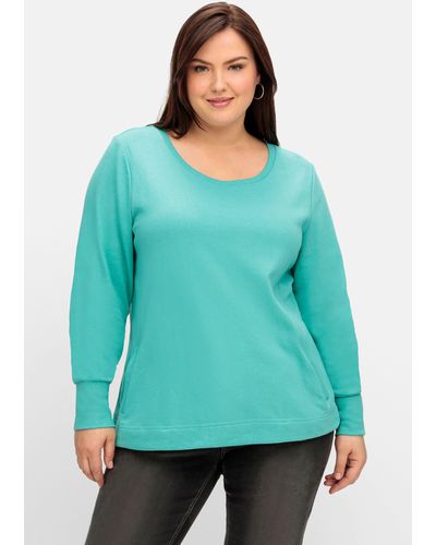 Sheego Sweatshirt mit Taschen und tiefem Rundhalsausschnitt - Grün