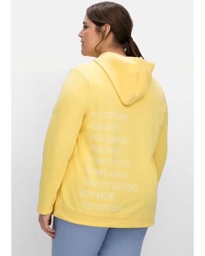 Sheego Kapuzensweatshirt mit Statementdruck - Gelb