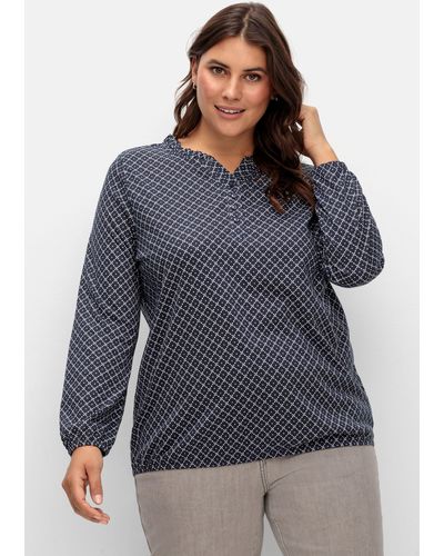 Sheego Shirt mit Tupfen-Alloverdruck und gelegten Falten in Grau | Lyst DE