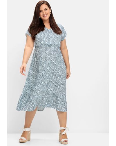 Sheego Kleid mit Alloverdruck und Tunika-Ausschnitt in Grau | Lyst DE