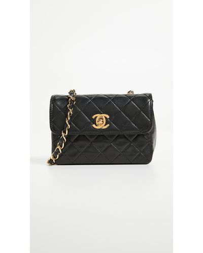 What Goes Around Comes Around Chanel Lambskin Half Flap Micro Bag - Black
