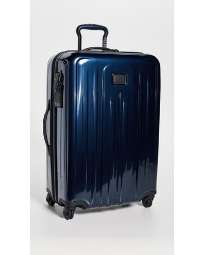 Tumi V4 Collection 22-inch International Expandable Spinner Carry-on - Blue