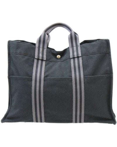 Hermès Fourre Tout Canvas Clutch Bag (pre-owned) in Blue
