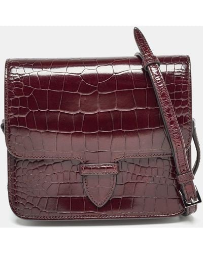 Alaïa Embossed Leather Crossbody Bag - Purple