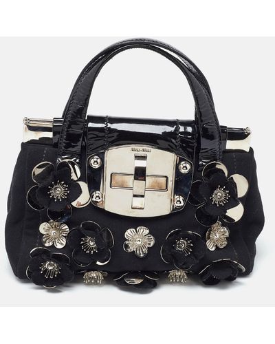 Miu Miu Canvas And Patent Leather Flower Embellished Satchel - Black