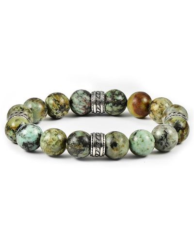 Crucible Jewelry Crucible Los Angeles 12mm African Turquoise Bead Stretch Bracelet With Stainless Steel Accent Beads - Green
