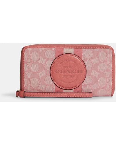 COACH Dempsey Large Phone Wallet In Signature Jacquard With Stripe And Coach Patch - Pink