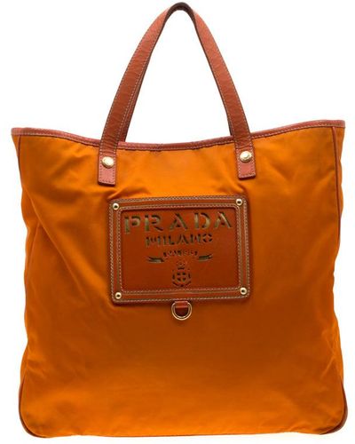 Prada Nylon And Leather Lasercut Logo Tote - Orange