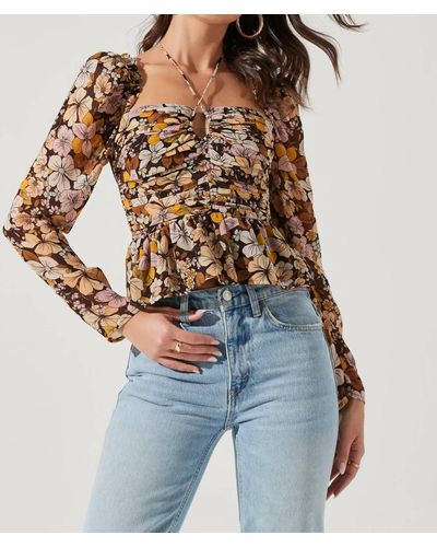 Astr Toni Ruched Halter Long Sleeve Peplum Top In Brown Yellow Floral - Blue