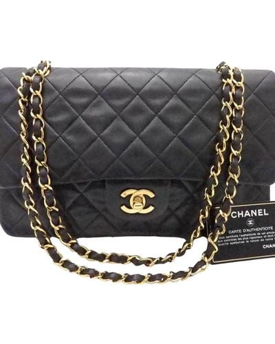 Timeless Chanel Brown Classic Small Suede lined Flap Bag Dark