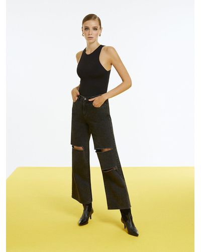 Nocturne High-waisted Ripped Jeans - Yellow