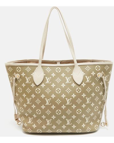 Louis Vuitton /khaki Monogram Empreinte Leather Neverfull Mm Bag - Metallic