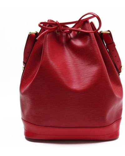 Leather purse Louis Vuitton Red in Leather - 26339245